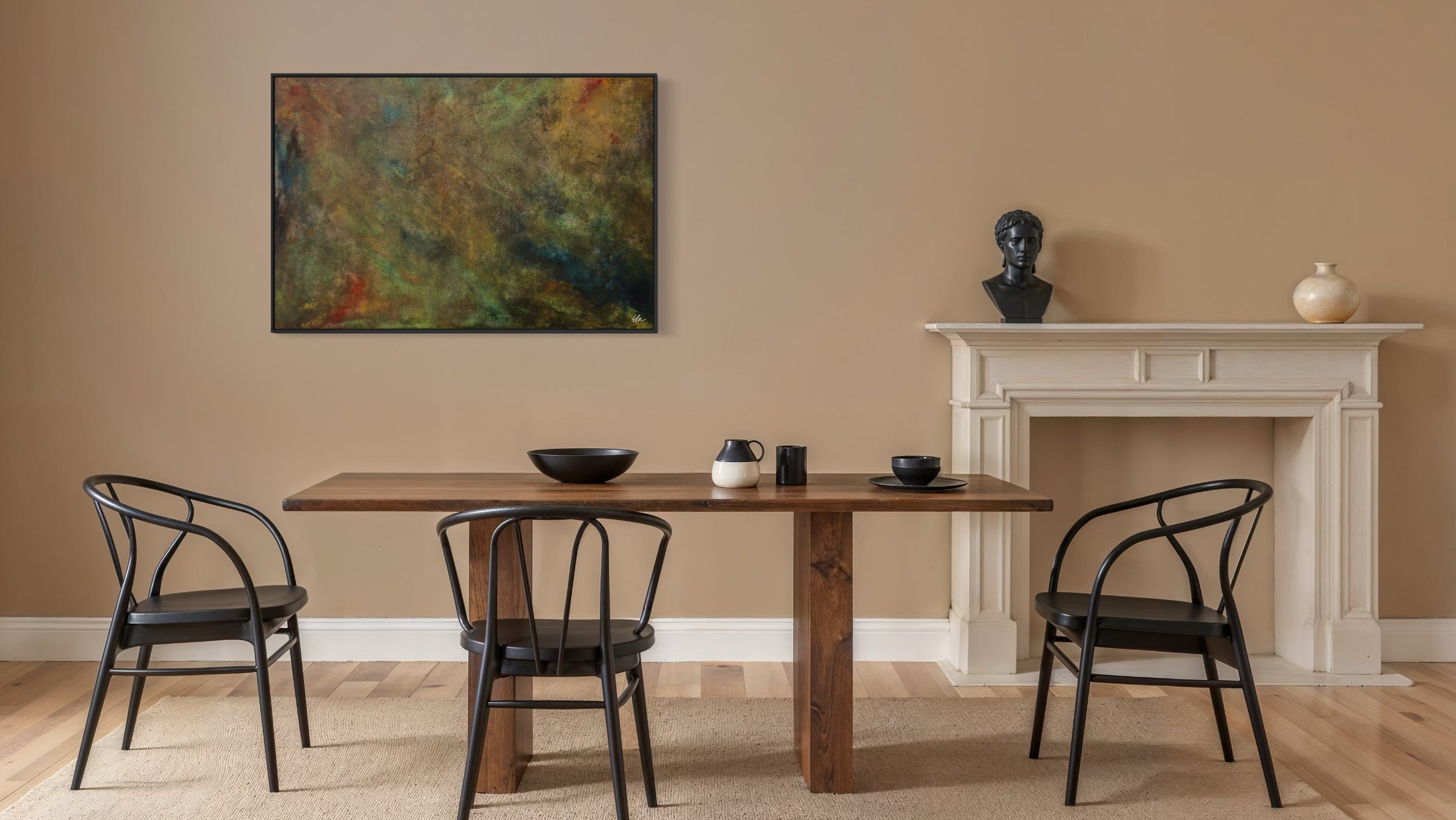 Dining room with wooden table and black chairs, featuring a fireplace and abstract painting.