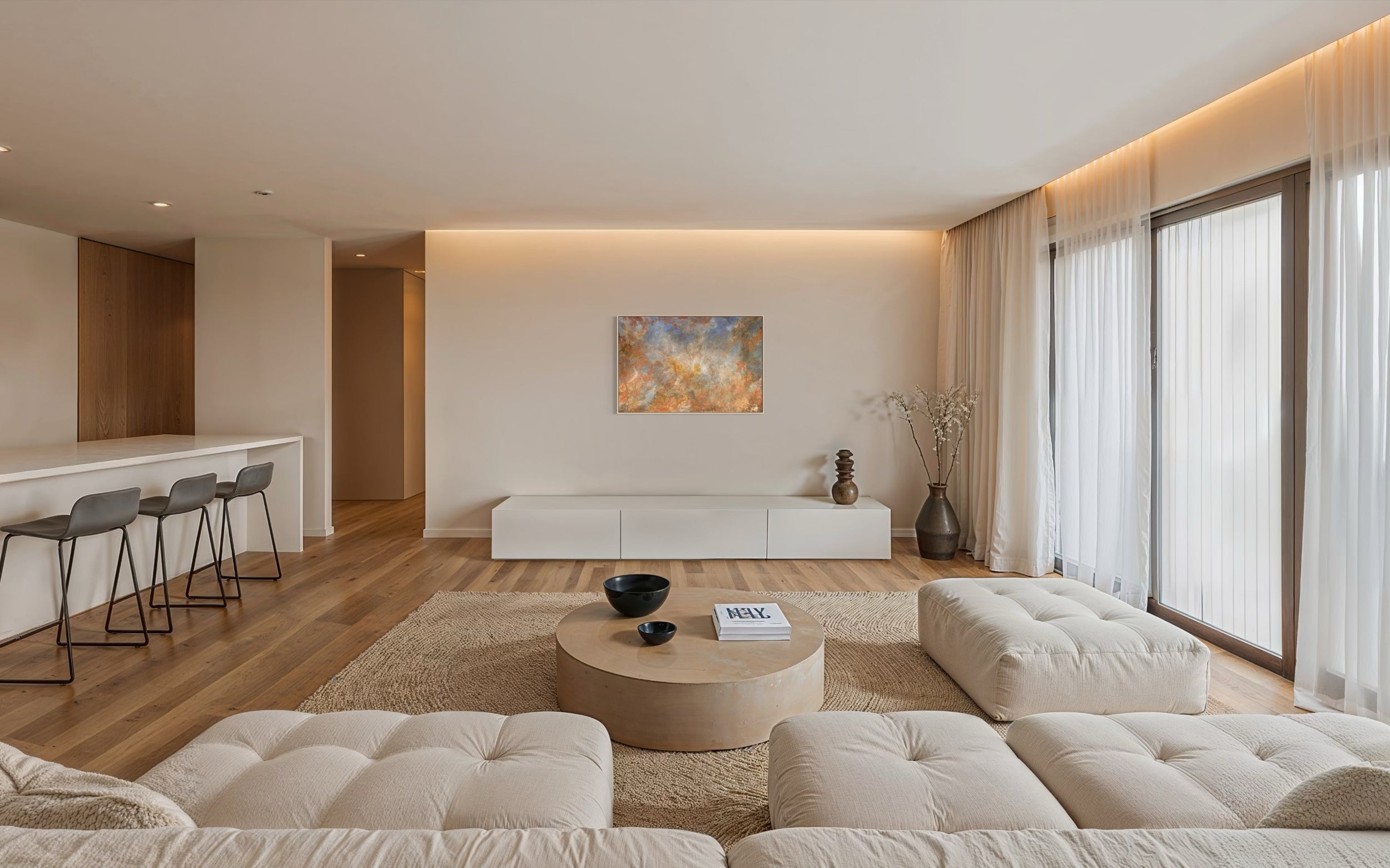 Modern living room with neutral tones and minimal decor