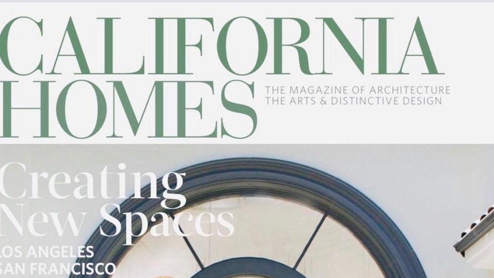 Cover of 'California Homes' magazine featuring a large arched window.