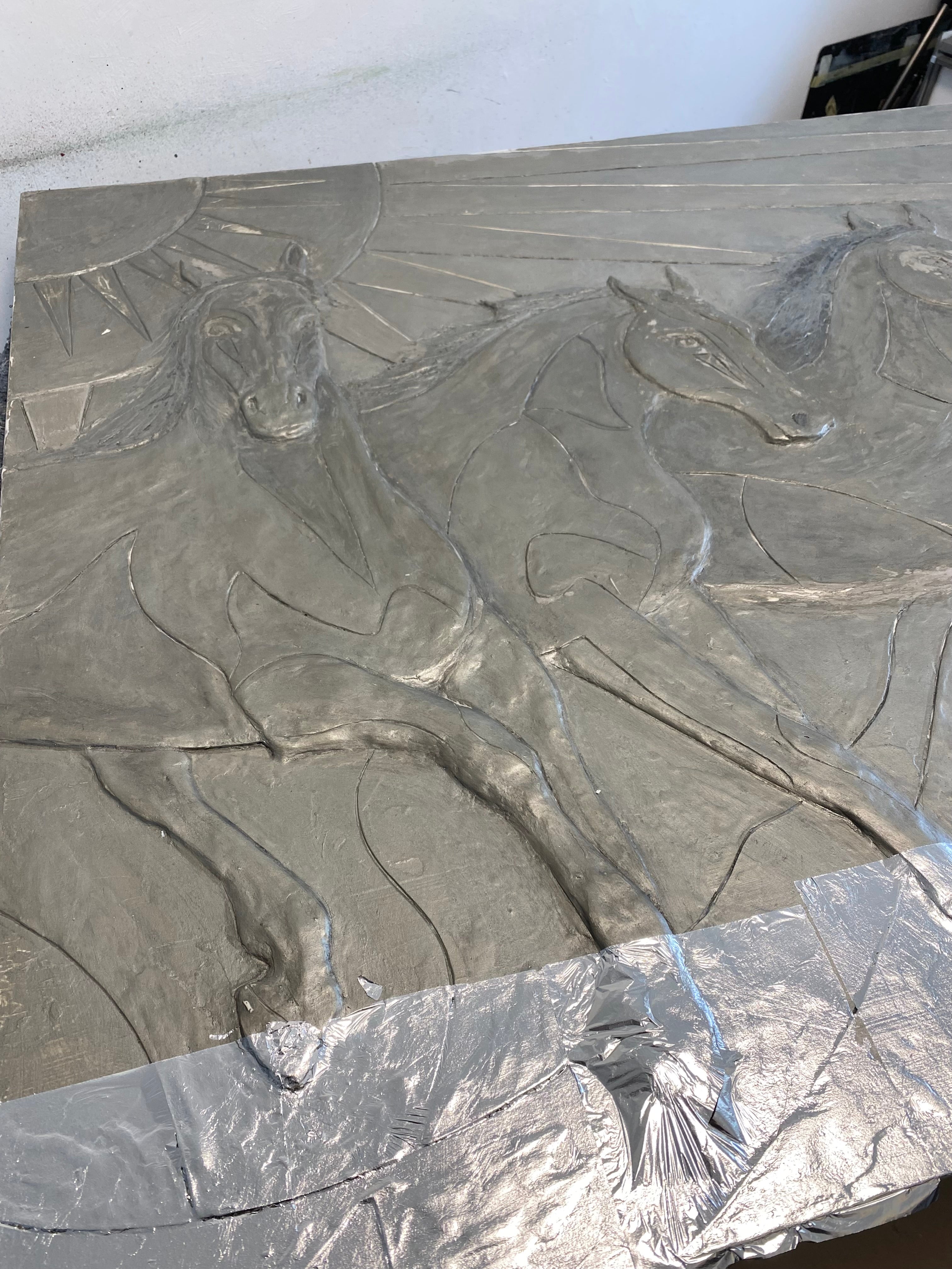 Progress image of the silver-leafing of the artwork